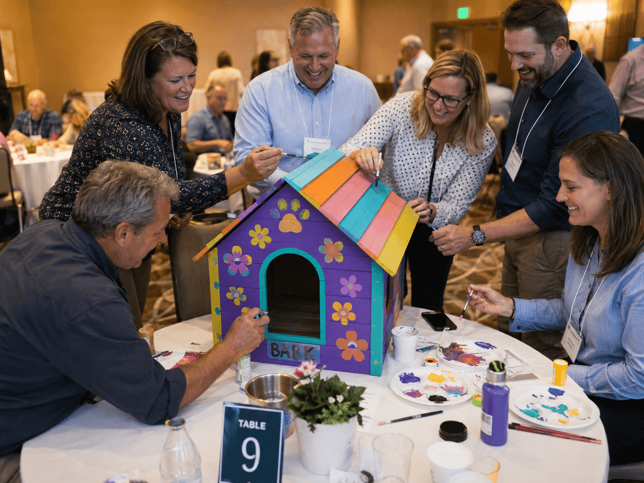 A finished, decorated dog house built by a corporate team at Housewarming