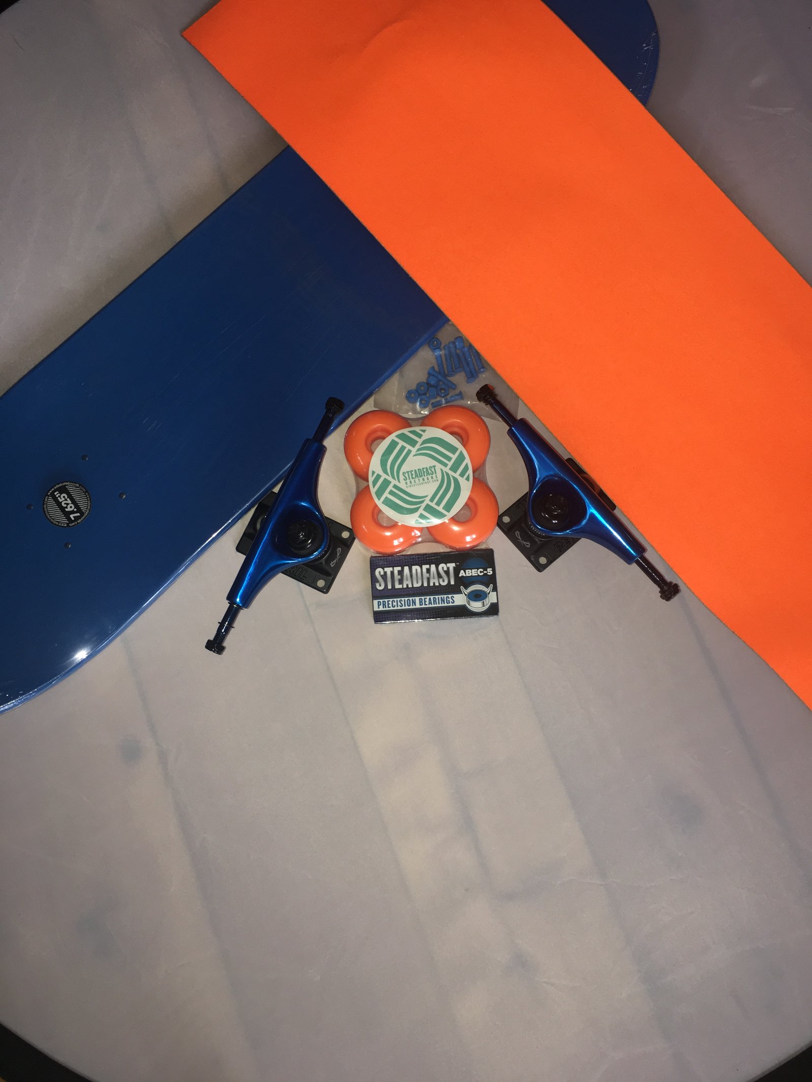 Skateboard components assembled by a team for donation